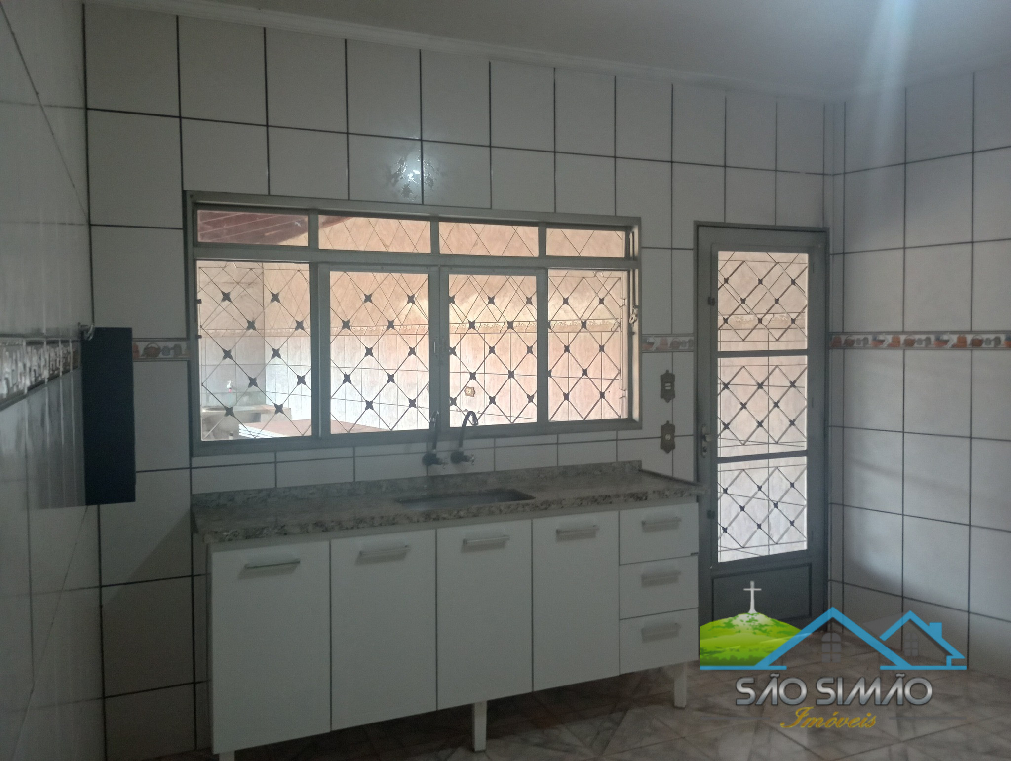 Casa com ponto comercial a venda em São Simão SP